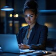 © Attasit - Businesswoman in a suit working in a secure workplace
