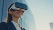 © vefimov - Smiling woman wearing VR goggles, standing in front of modern building, showcasing cutting-edge technology integration into daily life.