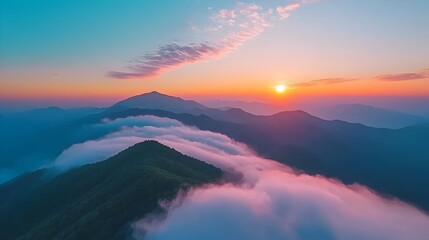 Poster - Breathtaking Misty Mountain Landscape at Sunrise with Soft Pink Clouds Casting a Dreamy Ethereal Glow Over the Serene Wilderness Scene