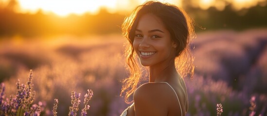 Poster - Young woman with long brown hair smiles in a field of lavender.