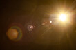 © filins - Sun flare on the black background