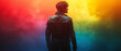 © Quant Media - An illustration of man silhouette against a rainbow-colored wall symbolizing LGBTQ pride, diversity and freedom.