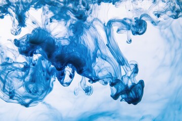 Wall Mural - Dynamic blue ink swirling in water, creating beautiful abstract patterns and textures for artistic backgrounds.