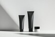 © anzodesign - Minimalist mockup of men's cosmetics arranged on a bright surface with soft shadows