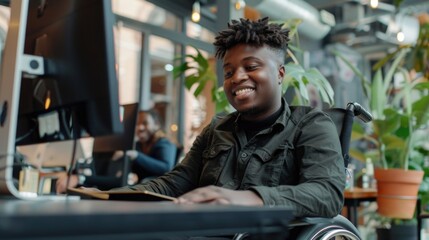 Poster - A woman using a laptop from her wheelchair, with a focused expression
