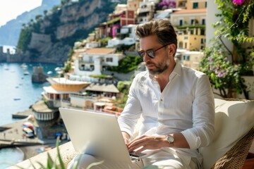 Poster - A person sitting on a couch with a laptop, possibly working or browsing online