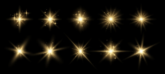 Poster - Set of golden glowing sparkles and stars, shining bursts with glitters and sequins around. Group of light effects on the black background. Vector illustration.