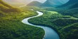 © kiimoshi - Aerial view of a winding river surrounded by lush greenery and mountains, capturing the beauty of nature's landscape.