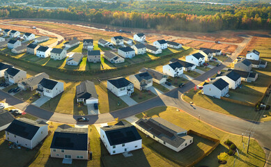 Aerial view of tightly packed homes in South Carolina residential area. New family houses as example of real estate development in american suburbs