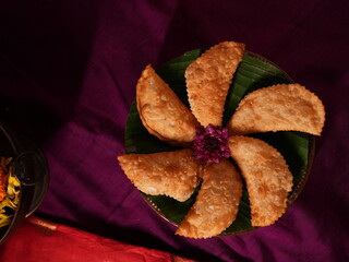 Indian traditional sweet karanjee filled with coconut and dryfruits filling