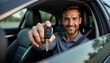 © zettar - A man is holding a car key and smiling
