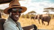 © 69 - A stylish man smiles during a safari adventure, surrounded by wildlife, capturing the joy of exploring nature