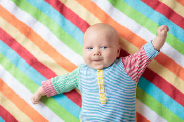Wall Mural - little baby on white bed