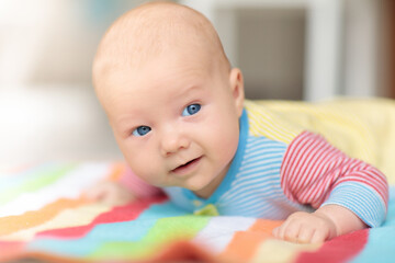 Wall Mural - little baby on white bed