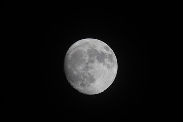 the moon in evening time with bllack sky background