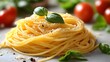 © pkproject - Appetizing Homemade Italian Spaghetti Pasta Dish with Tomatoes and Fresh Basil