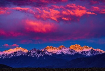 Wall Mural - spectacular majestic peaks silhouetted brilliant vibrant sunset sky warm colors clouds, mountains, horizon, nature, landscape, evening, dusk, scenery, light