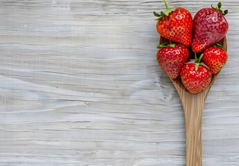 Wall Mural - Heart Shaped Strawberries On Wooden Spoon