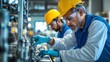 © fotofabrika - Workers assembling mechanical components in a factory with safety gear during the daytime