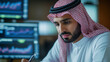 © webcesastock - Uomo d'affari Arabo fa conti di business e trading