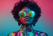 © Riya - Vibrant portrait of a person with curly hair and futuristic sunglasses