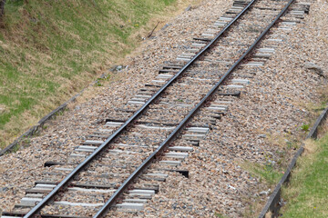 Bogota colombia railway near to green grass with stones in sunny day