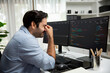© InfiniteFlow - Stressful IT developer having eyestrain to overwork in data software development on two pc screen, creating application program update version online website page system at modern office. Surmise.