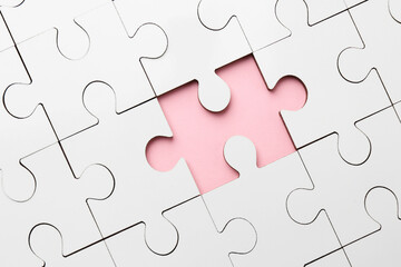 Poster - White puzzle with missing piece on pink background, top view