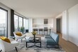 © Michael - Sleek Apartment Design with Bright Open Living Space and White Walls