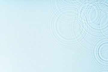 Poster - gentle ripples form on a serene blue surface
