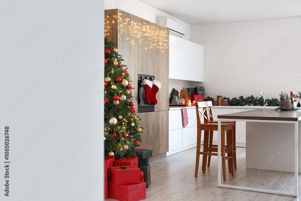 Interior of light kitchen with Christmas decor