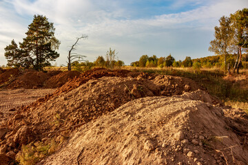 Mounds of soil brought in to level the area