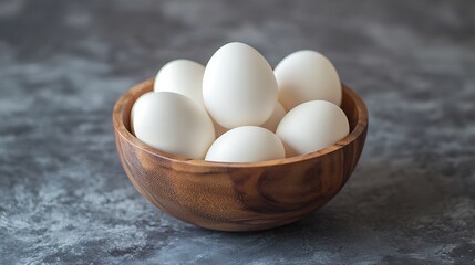 Canvas Print - White Eggs in a Wooden Bowl