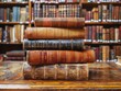 © azlen - Banner or header image with stack of antique leather books in library. literature or reading concept. - ai