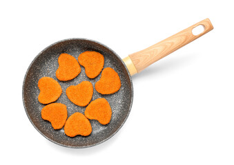 Canvas Print - Frying pan with tasty nuggets in shape of heart on white background. Valentine's Day celebration