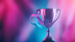 © sornram - Shiny trophy with ribbon on colorful background, celebrating achievement and success.