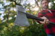© be free - Axe in man hand chopping wood. Cutting wood. Sharp blade. Brutality and masculinity. Lumberjack with axe in selective focus. Brutal lumberjack. Wood chopper with sharp blade.. Man with axe blade