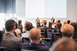 © kasto - Interview and round table discussion at business convention and presentation. Audience at the conference hall. Business and entrepreneurship symposium.