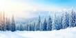 © Bay - A serene winter landscape unfolds with glistening snow-covered trees and majestic mountains under a radiant winter sky at sunrise