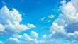© kaitanan - A vibrant afternoon sky with a few scattered cumulus clouds floating lazily. The bright, clear blue backdrop and the fluffy white clouds create a classic and cheerful summer day.