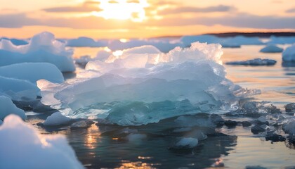 Wall Mural - Ice crystals shimmering on water, illuminated by the warm glow of a setting sun