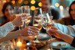 © Larisa - Friends toasting with wine glasses at festive dinner