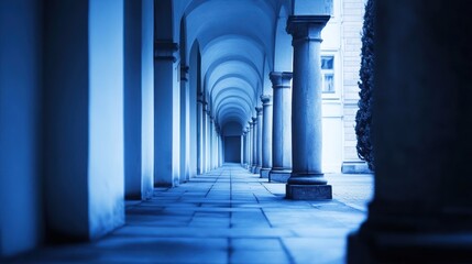 Poster - A serene corridor lined with arches and columns, creating a tranquil atmosphere.