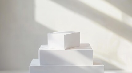 Canvas Print - A minimalist arrangement of white geometric shapes casting soft shadows on a light background.