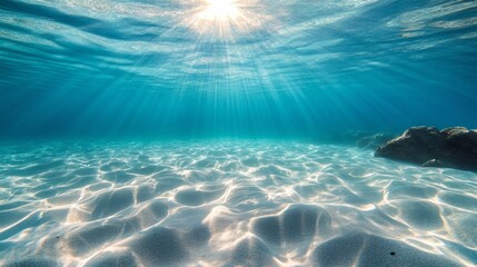 Poster - A beautiful blue ocean with sunlight shining through the water