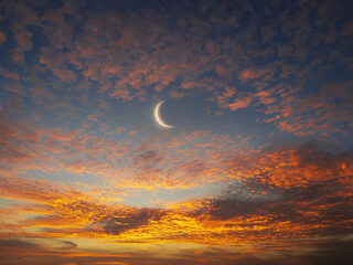 Wall Mural - young moon in the rays of sunset. moonrise in the sky above the clouds. celestial landscape with ear