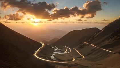 Wall Mural - Winding road through a lush mountain range on a rainy day under a cloudy sky