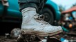© Chaikit - 2409_121.a close-up of a personâ€™s foot in a drenched sock with visible fuzz, juxtaposed with damp, muddy shoes nearby, highlighting the potential for mold and irritation