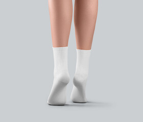 Sticker - Mockup of white medium socks on women's feet on tiptoes, for design, branding, advertising, back view.