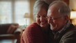 © Lion - Cheerful senior couple enjoying a light-hearted hug at home, reflecting love, happiness, and the strong bond of their retirement years.